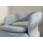 Fauteuil rotatif en tissu bouclé bleu clair