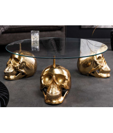 Table basse ronde originale avec crânes dorés